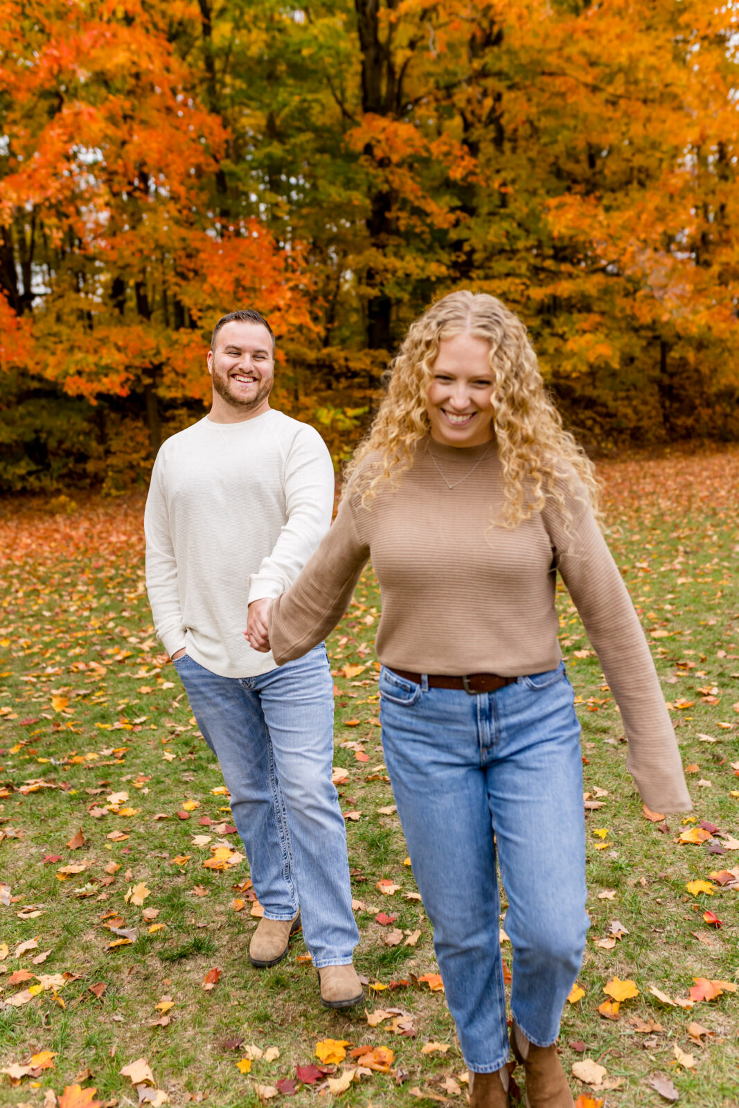 Cassie and Derrick laughing during Otterville engagement session