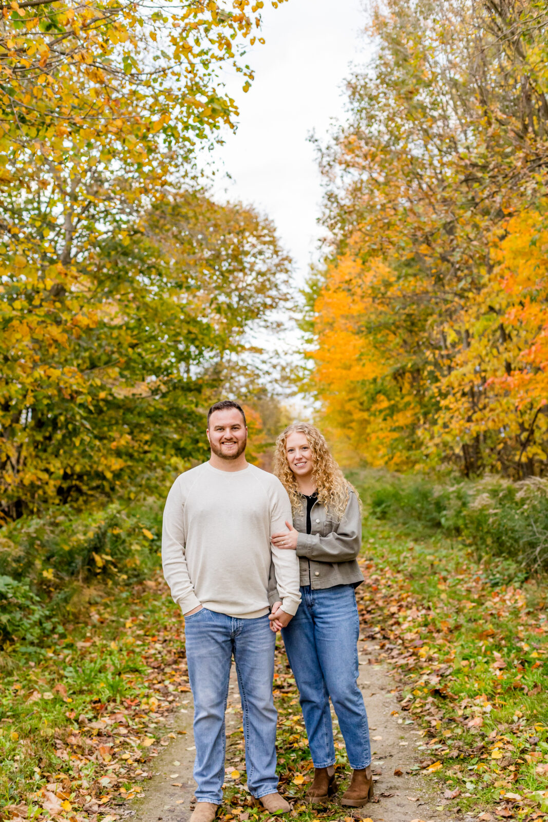 Otterville engagement session portrait with park and trail background