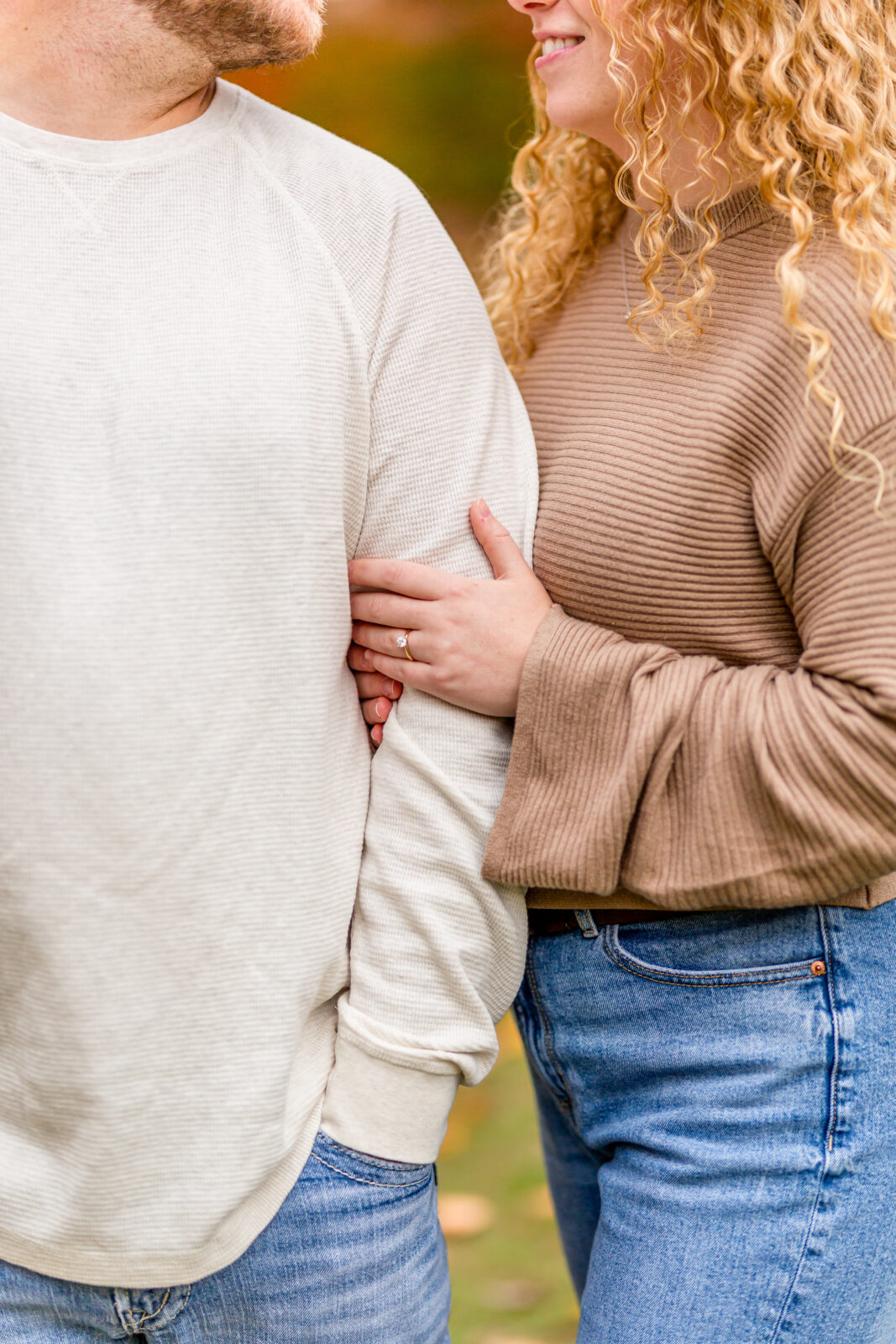 Golden autumn leaves with couple in Otterville engagement session