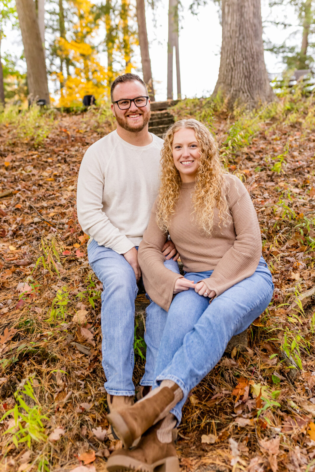 Cassie and Derrick cuddling during fall Otterville engagement session